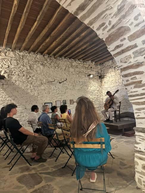 Classical guitar concert in a historic olive press - The recital flow: music first, then a break that turns into conversation