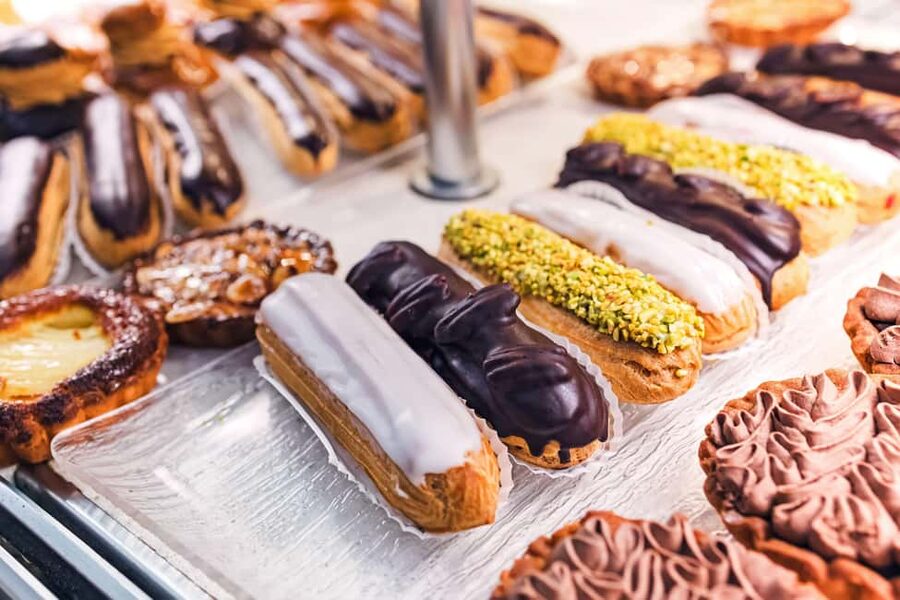 Paris Walk: Opera to Montmartre with Pastry & Chocolate - Le Bateau-Lavoir and Moulin de la Galette: art, atmosphere, and the hill’s build-up